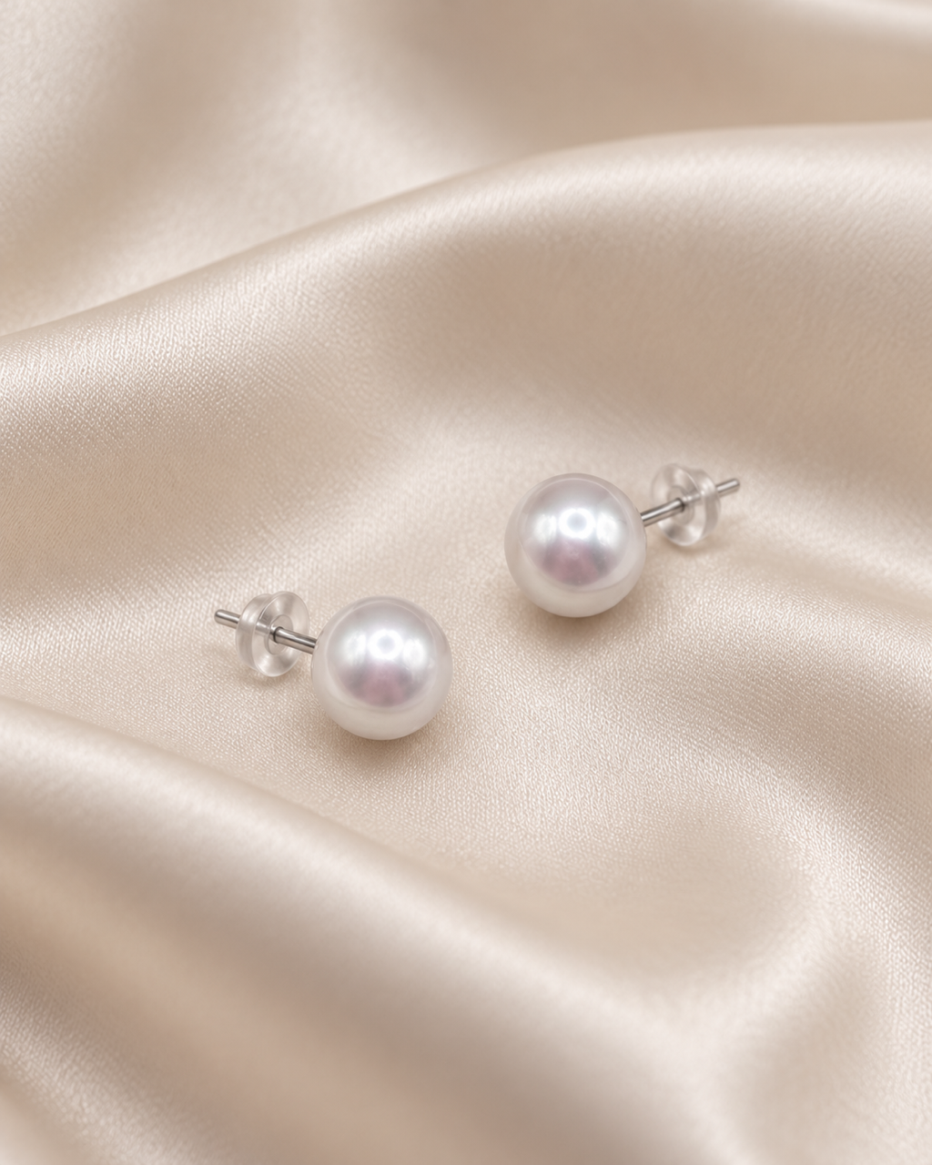 9mm white freshwater pearl stud earrings on ivory silk